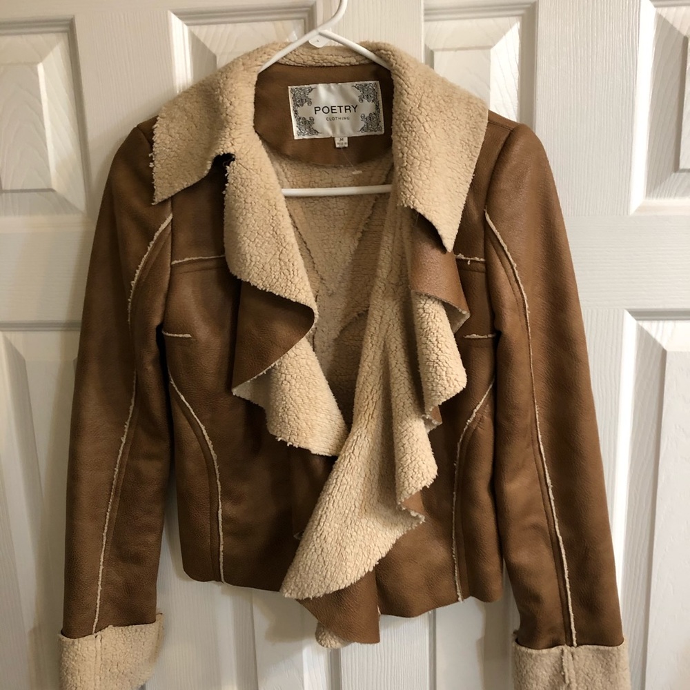 Faux suede brown jacket. Never worn